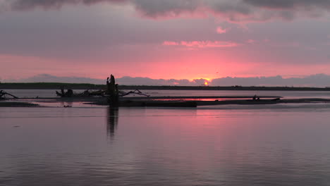 POV-Pan-shot-of-sunset-at-the-Tarcoles-river-mouth-at-the-Pacific-ocean