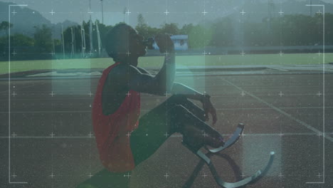 athlete with prosthetic legs drinking water, digital grid animation over track field