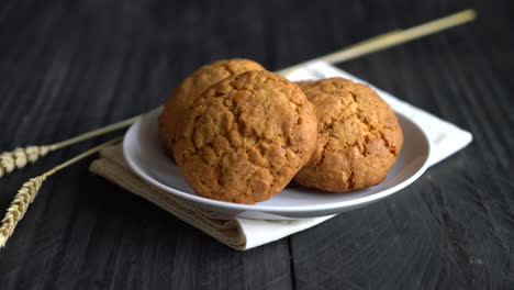 oatmeal-raisin-cookies-on-wooden-table