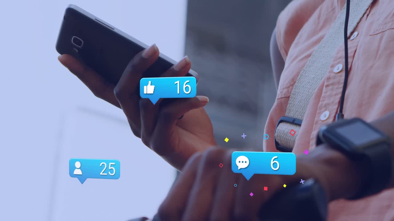 Animation of social media reaction over hands of biracial woman using smartphone