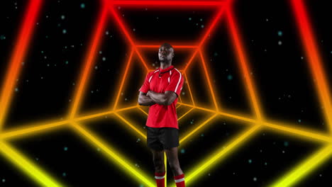 animation of african american male american football player with arms crossed over shapes