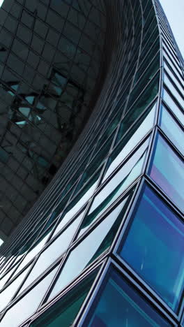 modern glass skyscraper architecture with curved design