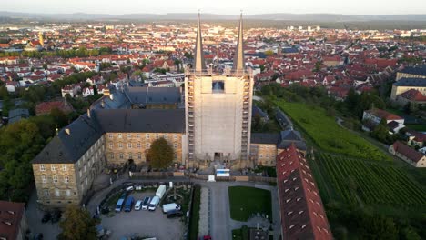 monastery michelsberg drone video side pan with cityscape in the background