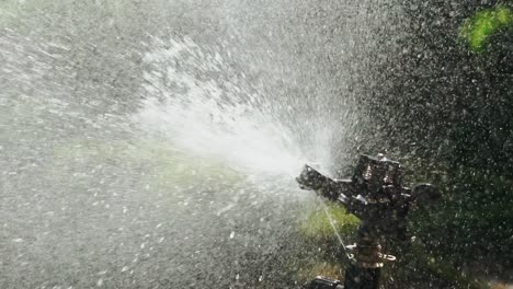 Automatic watering of lawn, garden. System automatic sprinkler. Slow motion