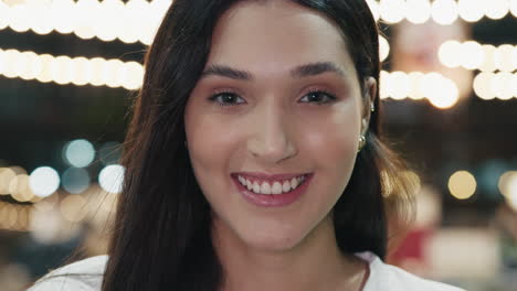 smiling woman portrait at night