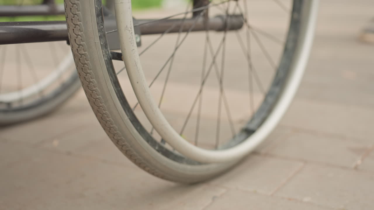 Inspecting Bicycle Components Closely, Detailed Inspection Of Bicycle Wheel And Tire Surface Features, Thorough Visual Assessment Focusing On Bicycle Wheel Integrity And Tread Pattern Analysis