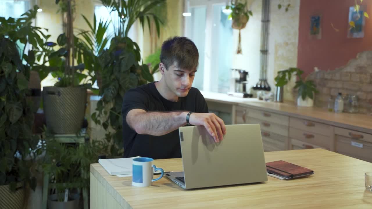 Young european Male Student enters the coffeehouse with organic background