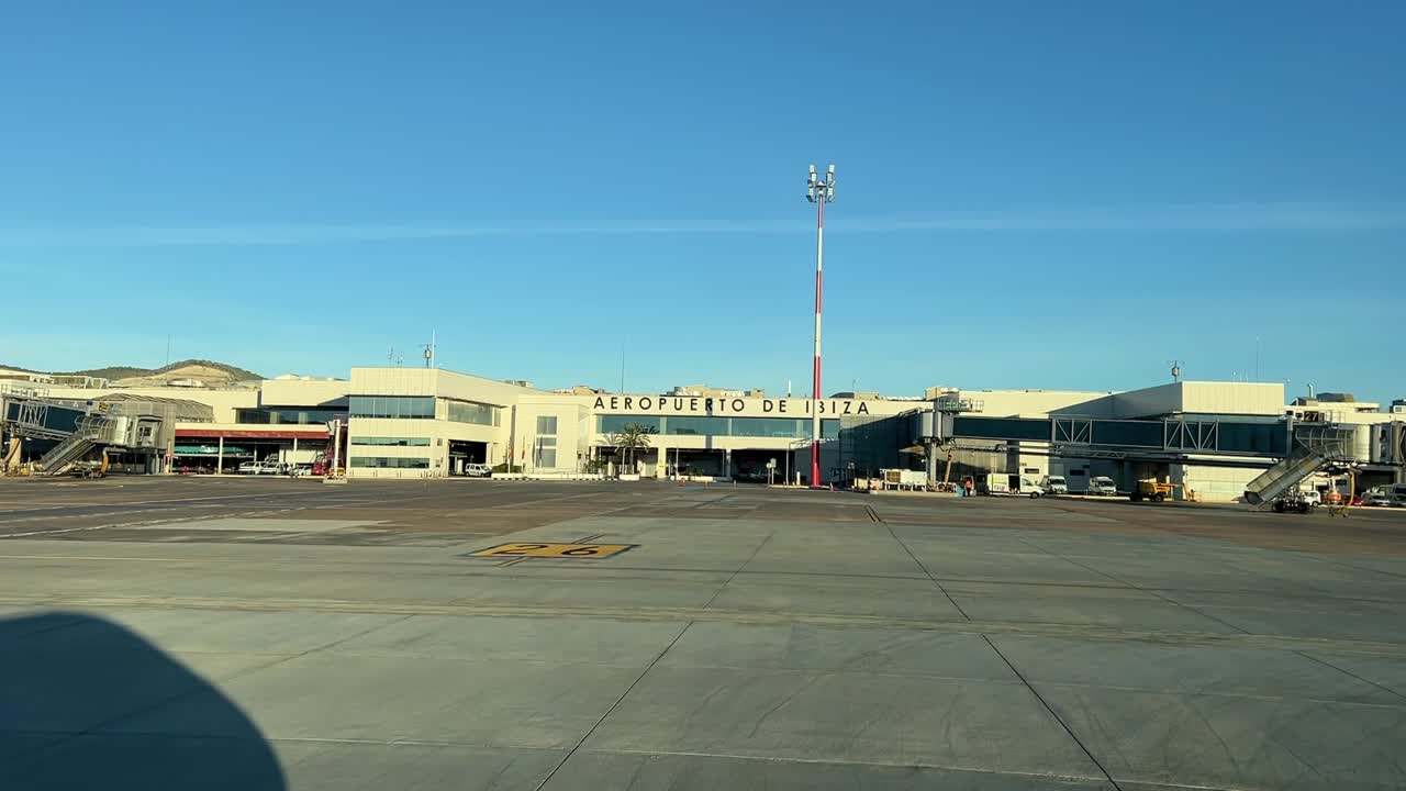 Arriving to the parking stand at Ibiza&rsquo;s airport, Spain, as seen by the pilots with the silhouette of the jet on the left side