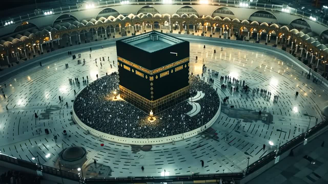 Aerial view video of the Kaaba surrounded by worshippers, showcasing the grand mosque's architecture