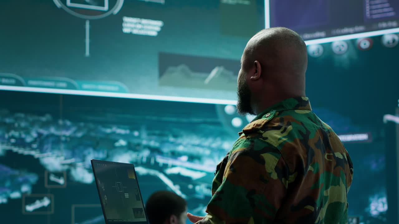 Military officer oversees surveillance and cybersecurity operations