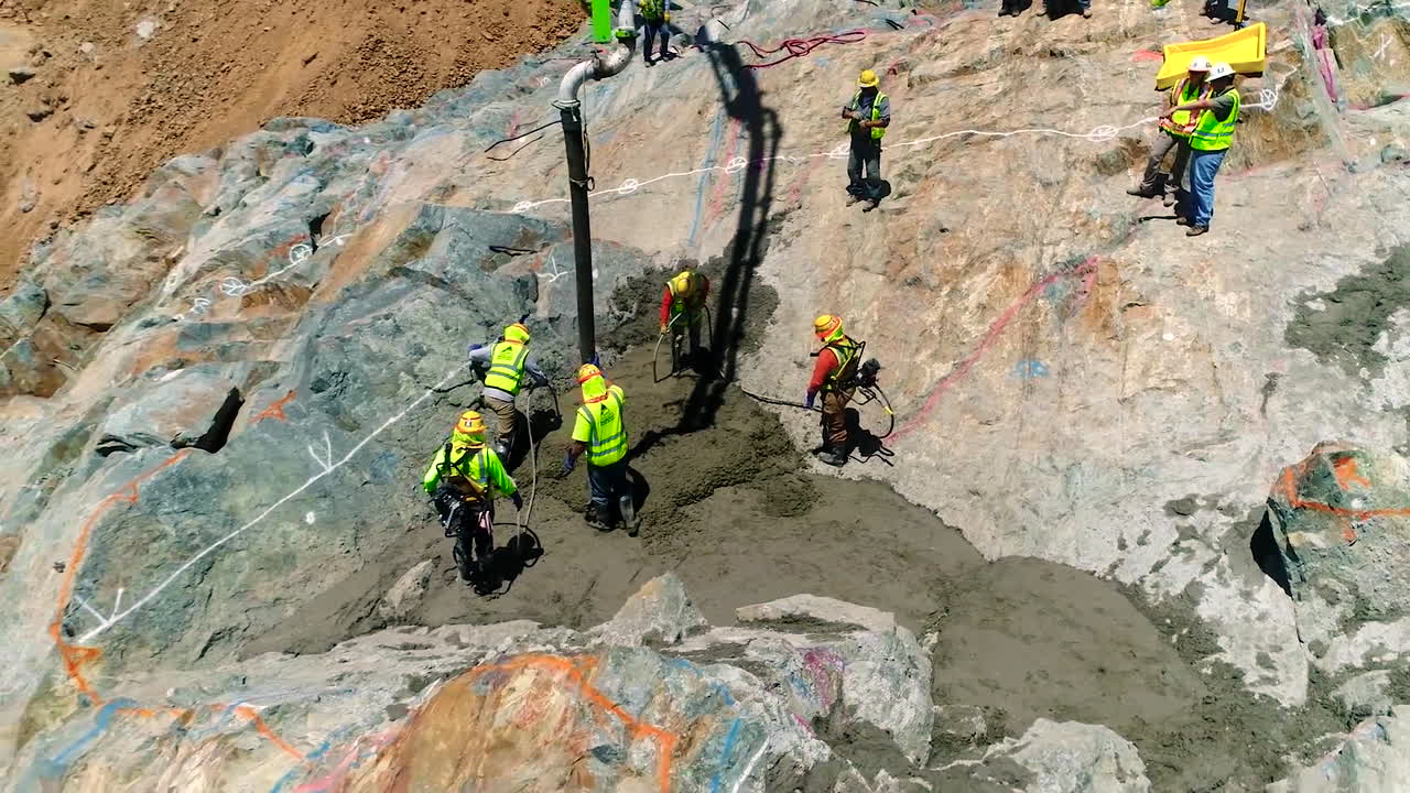 Aerial Of Workers And Equipment At The Construction Site Of A New Spillway At Oroville Dam California 14