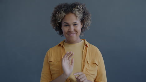Woman Showing Number Two and Five