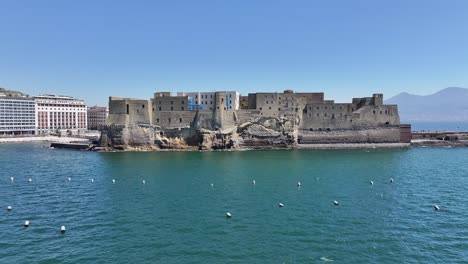 dell ovo castle at naples in campania italy. downtown cityscape. bay of naples landscape. dell ovo castle at naples in campania italy. medieval castle. skyline medieval building. italy landscape