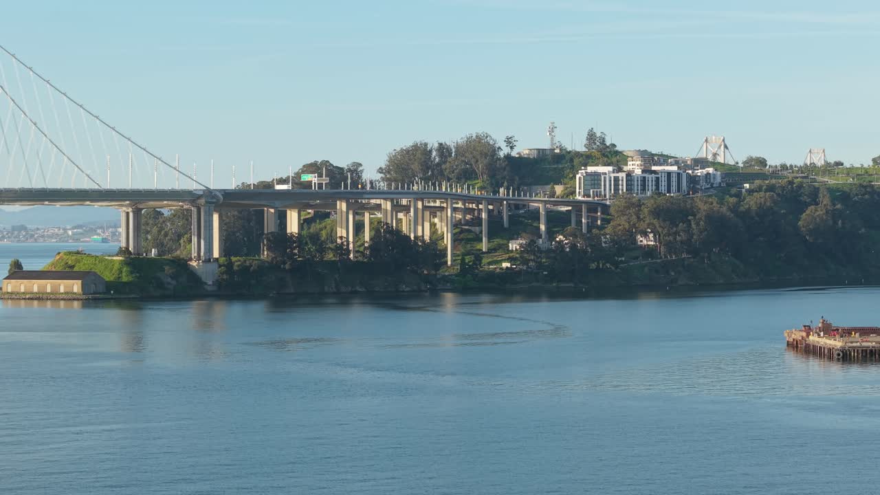 A rotating panning view left to right of Treasure Island and the San Francisco skyline in the distance. Filmed in 4K.