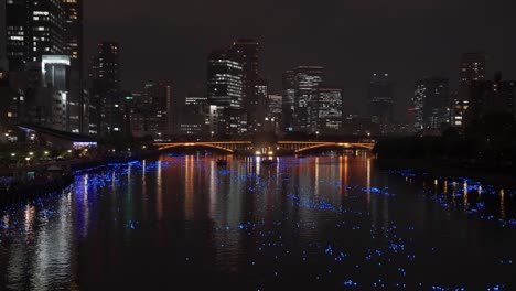 Osaka-at-Night,-Buildings-and-Illumination-of-Okawa-River-for-Tanabata