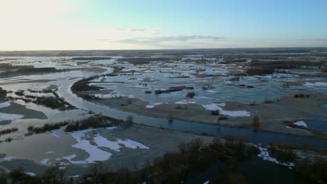 flooded and frozen fields around the narow river in the podlasie region during winter