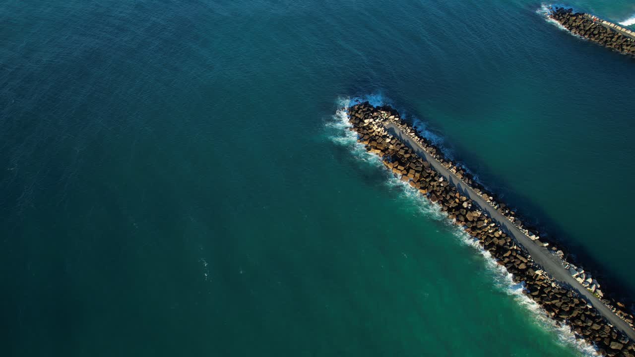 Above View Of Duranbah Seawall And South Head Seawall At Tweed Heads In New South Wales, Australia. Aerial Drone Shot
