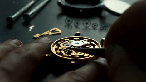 mechanical watch repair. watchmaker is repairing the mechanical watches