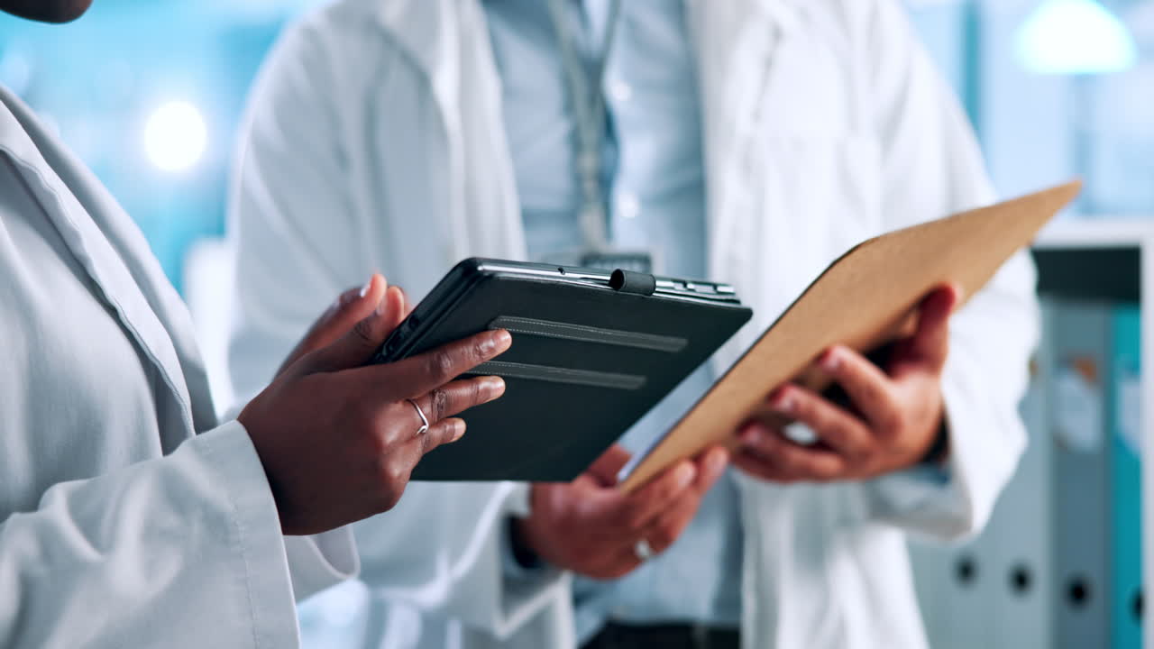 Doctors Discussing Patient Records