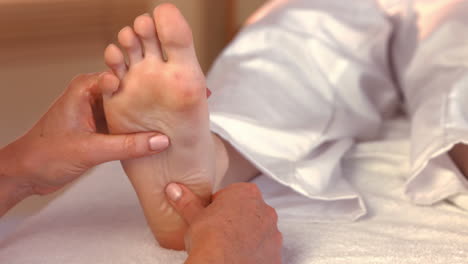 woman enjoying a foot massage