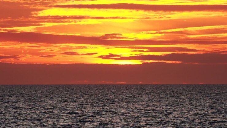 Sunset with empty vast ocean, background for graphics