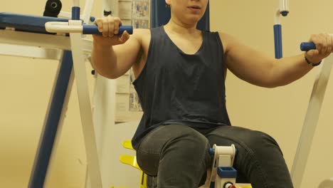 boy with disabilities  patient going through physical rehabilitation therapy. sport training