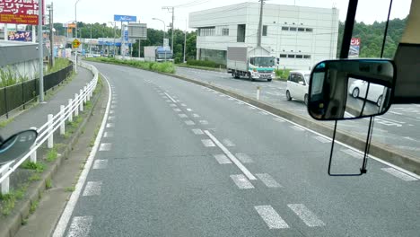 shot from inside the tour bus along the street - high way of japan