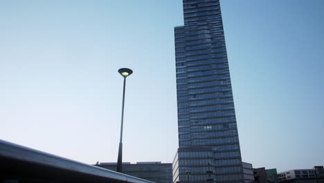 timelapse of the mediatower in cologne mediapark hansaring with a smooth slide from right to left and a tilt to the sky