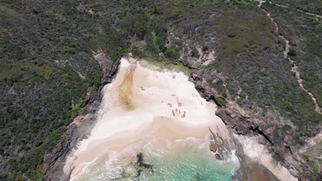 bongon beach with crystal clear water in frazer park, nsw, australia. - aerial shot