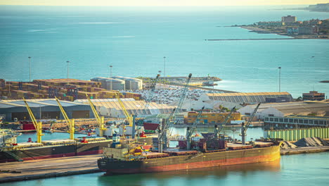 shipping terminal at the port of magala, spain - time lapse