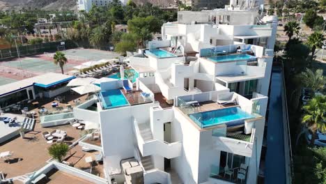 a panoramic view of a coastal hotel captured by a drone