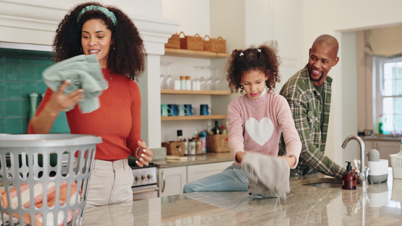 Family doing chores together in the kitchen