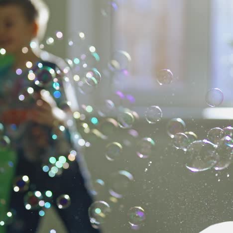 child catching soap bubbles