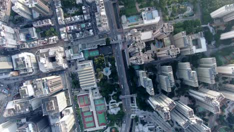 central hong kong, top down aerial view of traffic and city skyscrapers