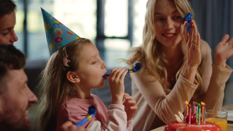 family enjoying virtual party. parents siblings celebrating birthday online.