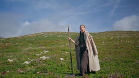 travel girl exploring mountain walking grassy hill. serene lady admiring nature