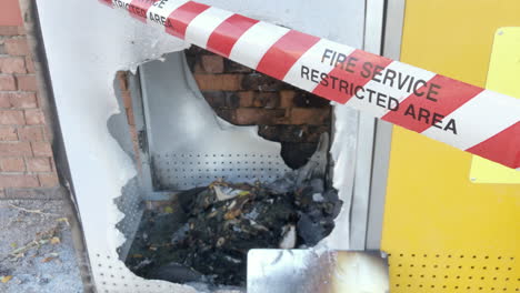 Fire-Service-Restricted-Area-tape-cordons-off-suspected-exploded-bin,-Brisbane-Australia