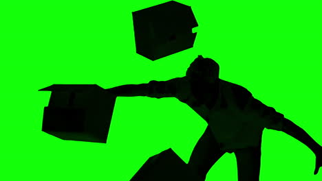 silhouette of clumsy man dropping boxes on green screen