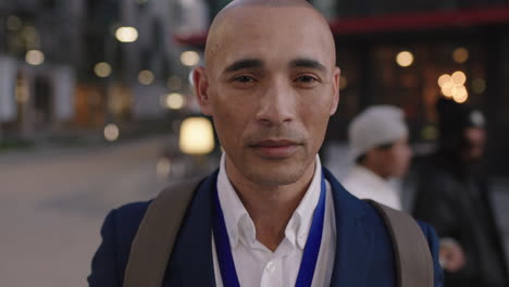 hispanic businessman looking professional portrait urban downtown