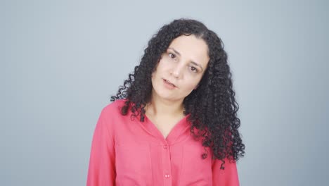 young woman getting angry at camera.