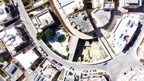 Private-luxury-houses-with-solar-panels-on-rooftops-in-Malta,-aerial-top-down-view