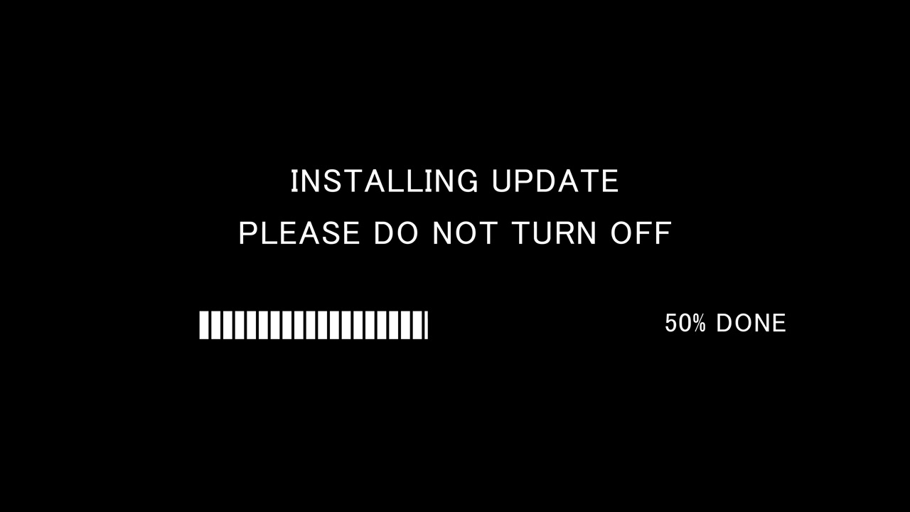 Video di una barra di avanzamento del caricamento con testo sullo schermo "installazione aggiornamento, non spegnere" su sfondo nero