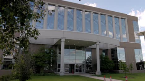 oakland county courthouse in michigan with gimbal video stable with trees