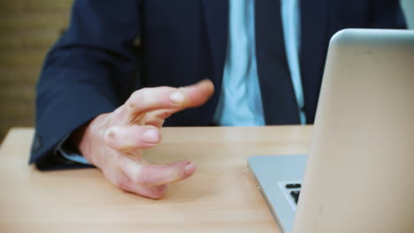 Angry-unrecognizable-businessman-boss-punches-the-table