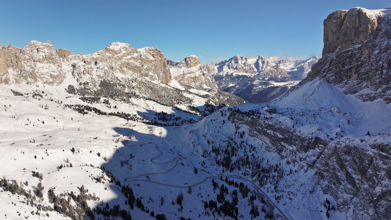Aerial drone view of the Gardena Pass high mountain pass in the Dolomites, Italy
