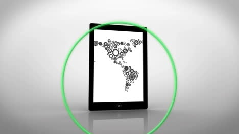 tablet displaying world map made of gears, surrounded by green circle animation