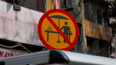 sign prohibiting trade from the counter on the street delhi, india