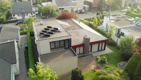 contemporary real estate property rooftop aerial orbit view low angle suburban netherlands neighbourhood