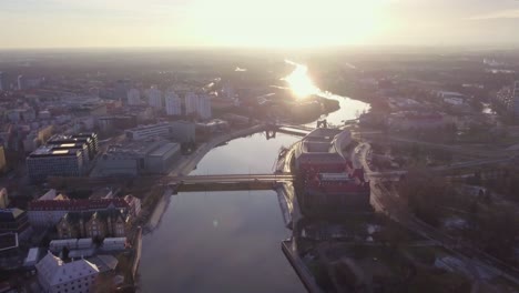 aerial view of a city moments after sunrise, lower silesia, poland