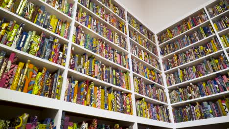 wall of books with fabric covered book covers